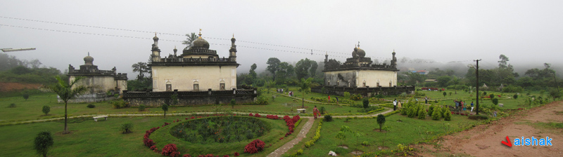 File:Raja's Tomb (Gaddige), a panoramic view from the backside. Can see the garden as well.jpg