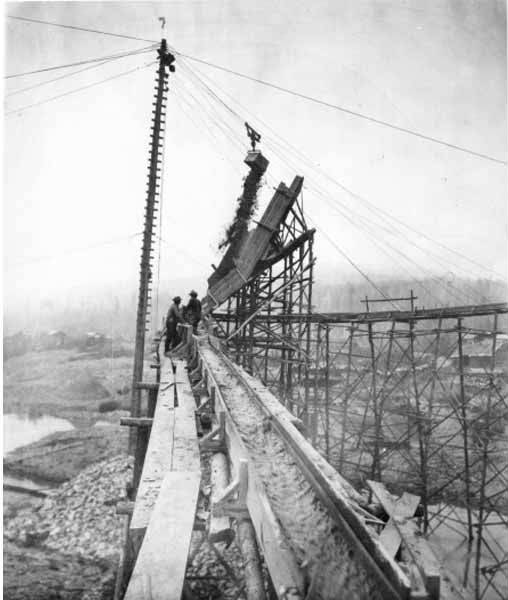 File:Two men working a large mining operation on Esther Creek, Fairbanks, ca 1914 (CURTIS 1967).jpeg