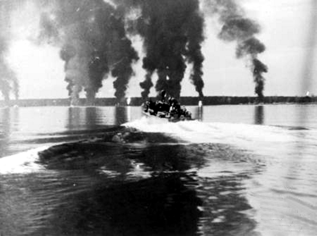 File:Burning oil wells at Seria (Brunei) 1945.jpg