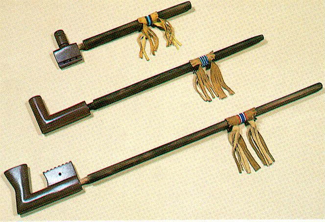 Various styles of Native American ceremonial pipes.