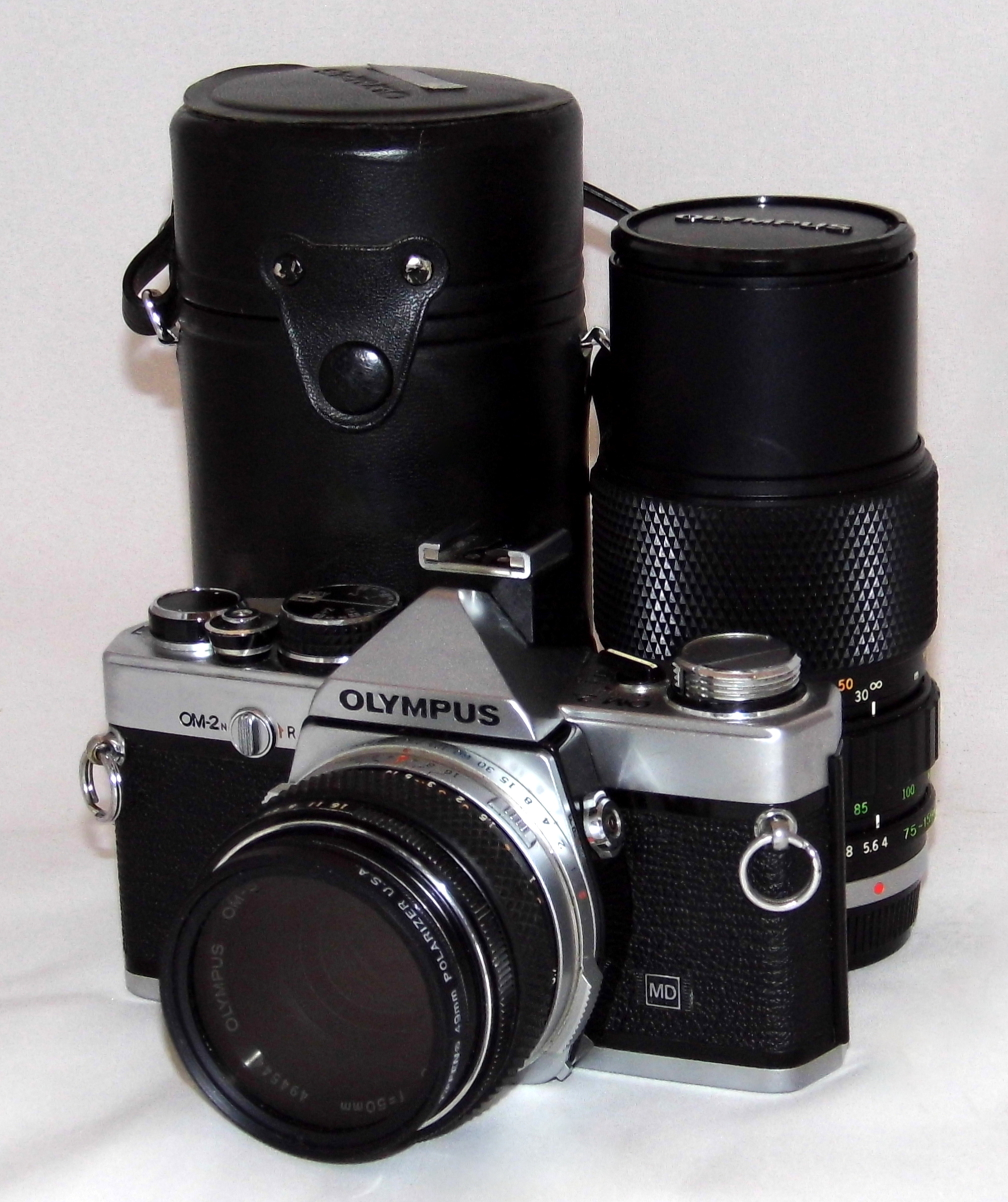 File:Vintage Olympus OM-2n 35mm SLR Film Camera With M. Zuiko 50mm F1.8  Lens And Zuiko 75-150mm Auto Zoom Lens, Made In Japan (35269573846).jpg -  Wikimedia Commons