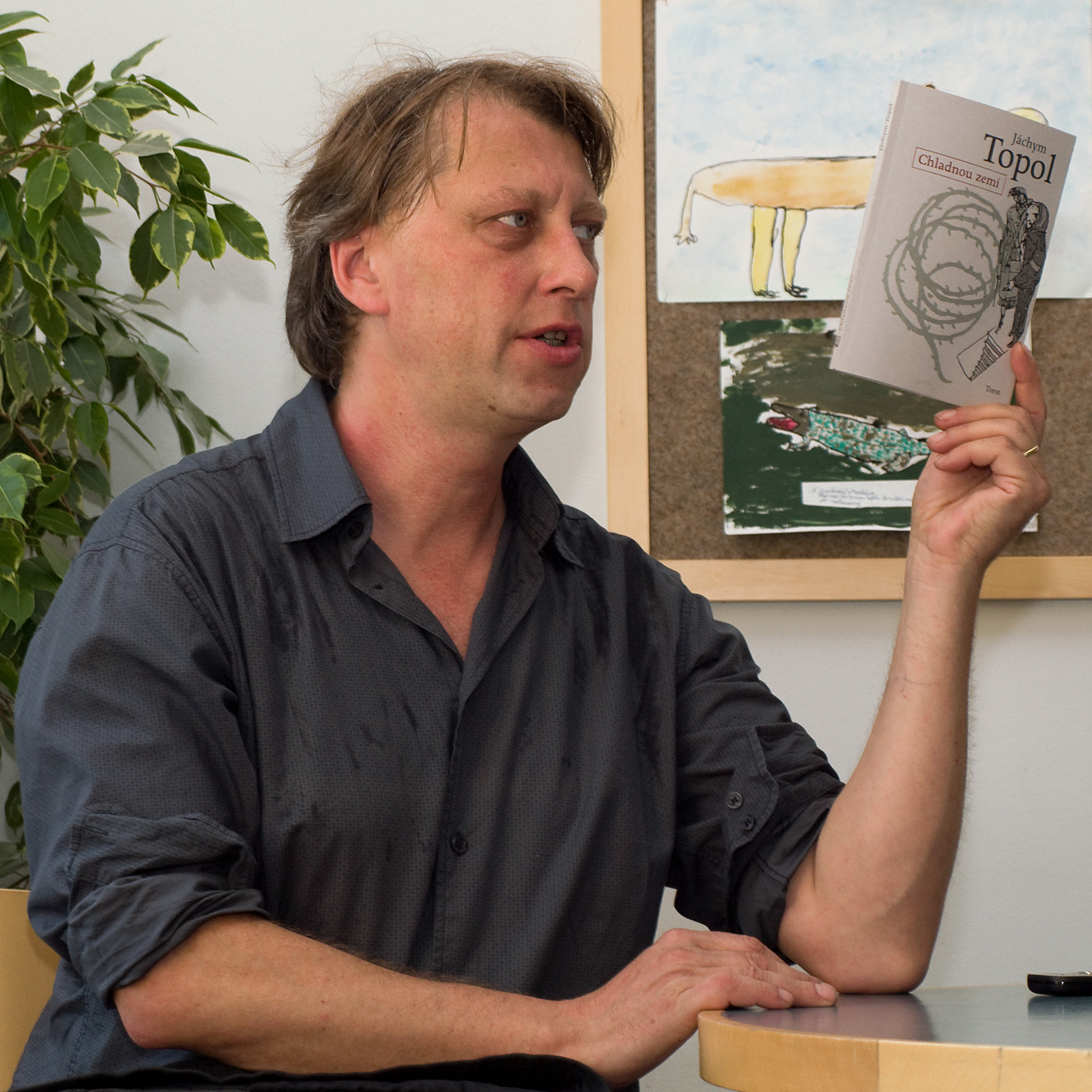 Jáchym Topol with his book ''Chladnou zemí'' (September 2010)