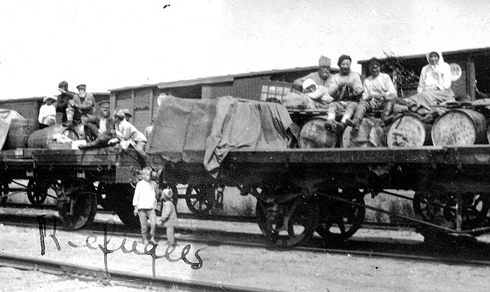 File:Refugees on flatcars.jpg