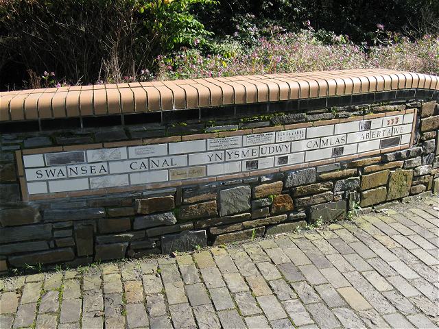 Commemorative wall on Swansea Canal towpath at Ynysmeudwy - geograph.org.uk - 1482726