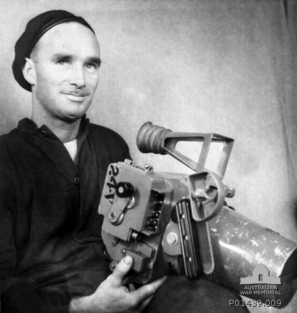 File:Aircraftman Morris with F24 camera c. 1941 AWM P01439.009.jpg