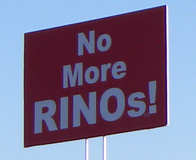 "No More RINOs!" sign at a 2010 Tea Party movement protest in Minnesota Tea Party tax day protest 2010 (4525419563) - No More RINOs!.jpg