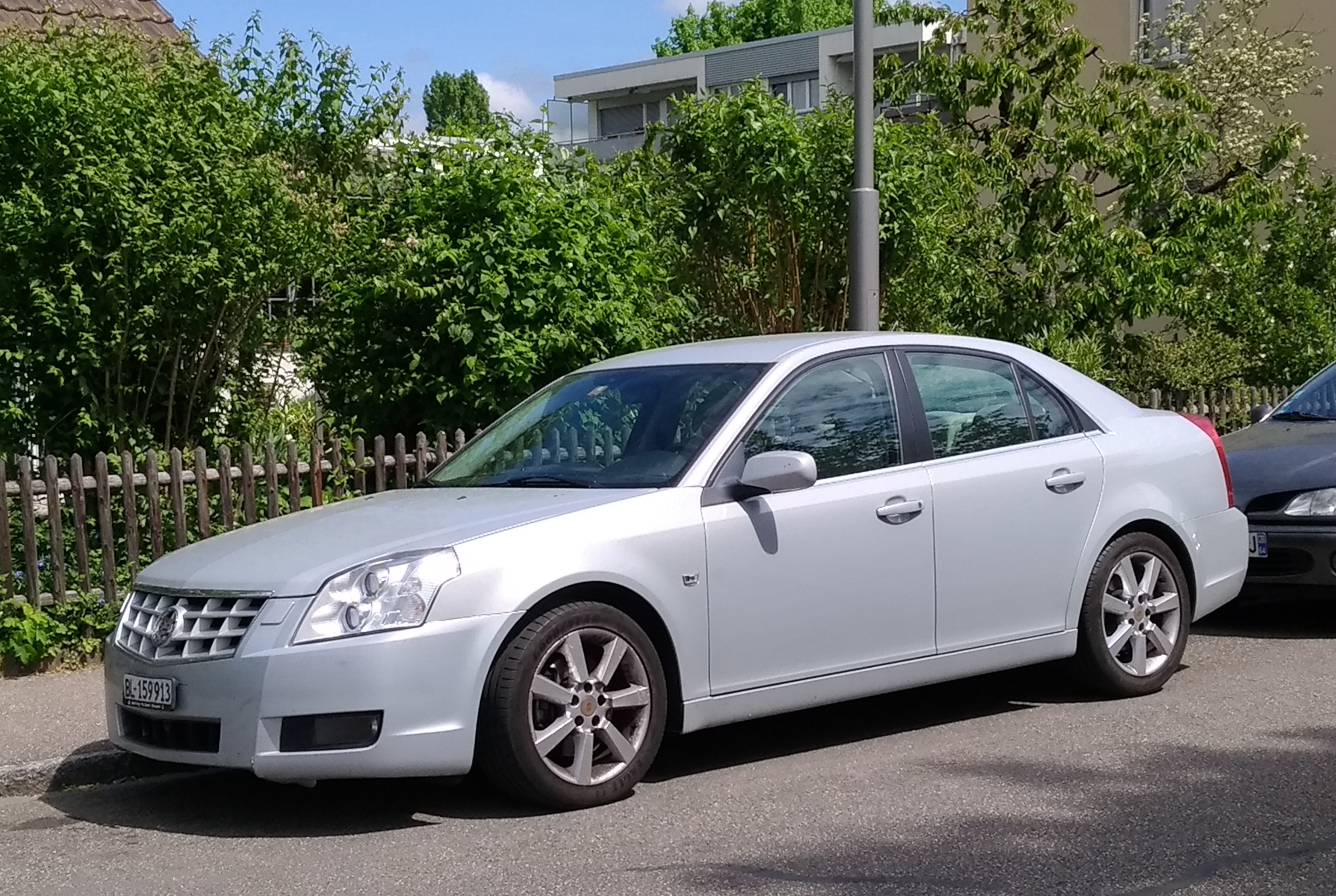 Cadillac bls аналог saab