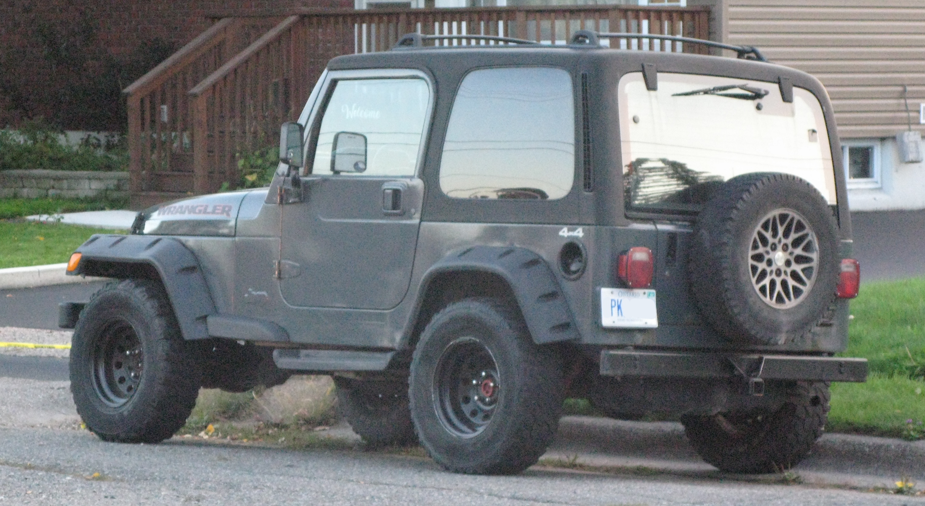 File:1997 Jeep Wrangler TJ SE, Rear Left,  - Wikimedia Commons