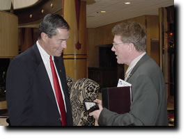 Knowles (left) with Dr. Kent Hill of USAID