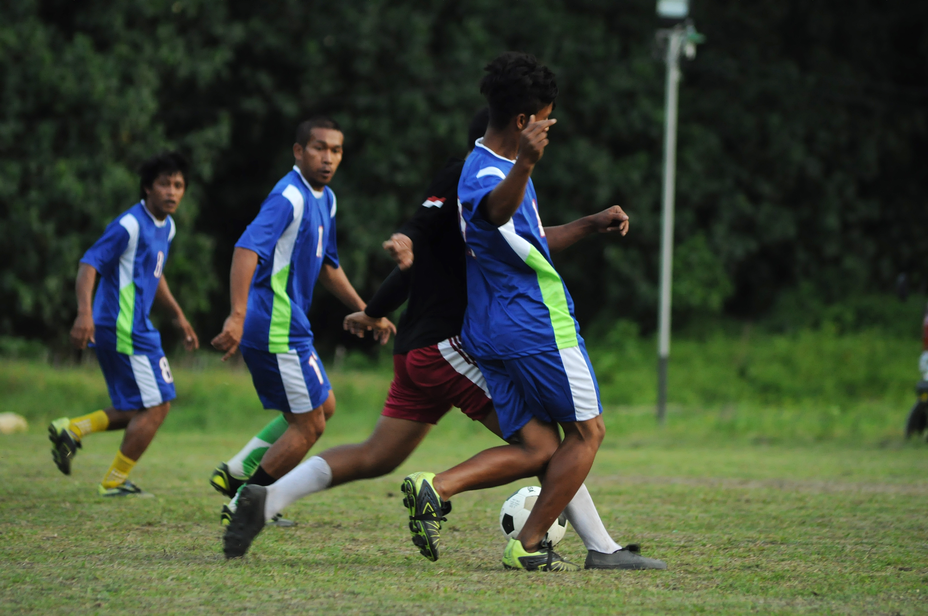 File:Soccer players in a village.jpg - Wikimedia Commons