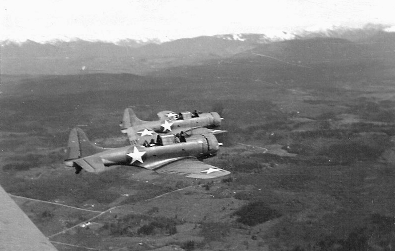 File:Two SBD Dauntless bombers over the Solomons c1942.jpg