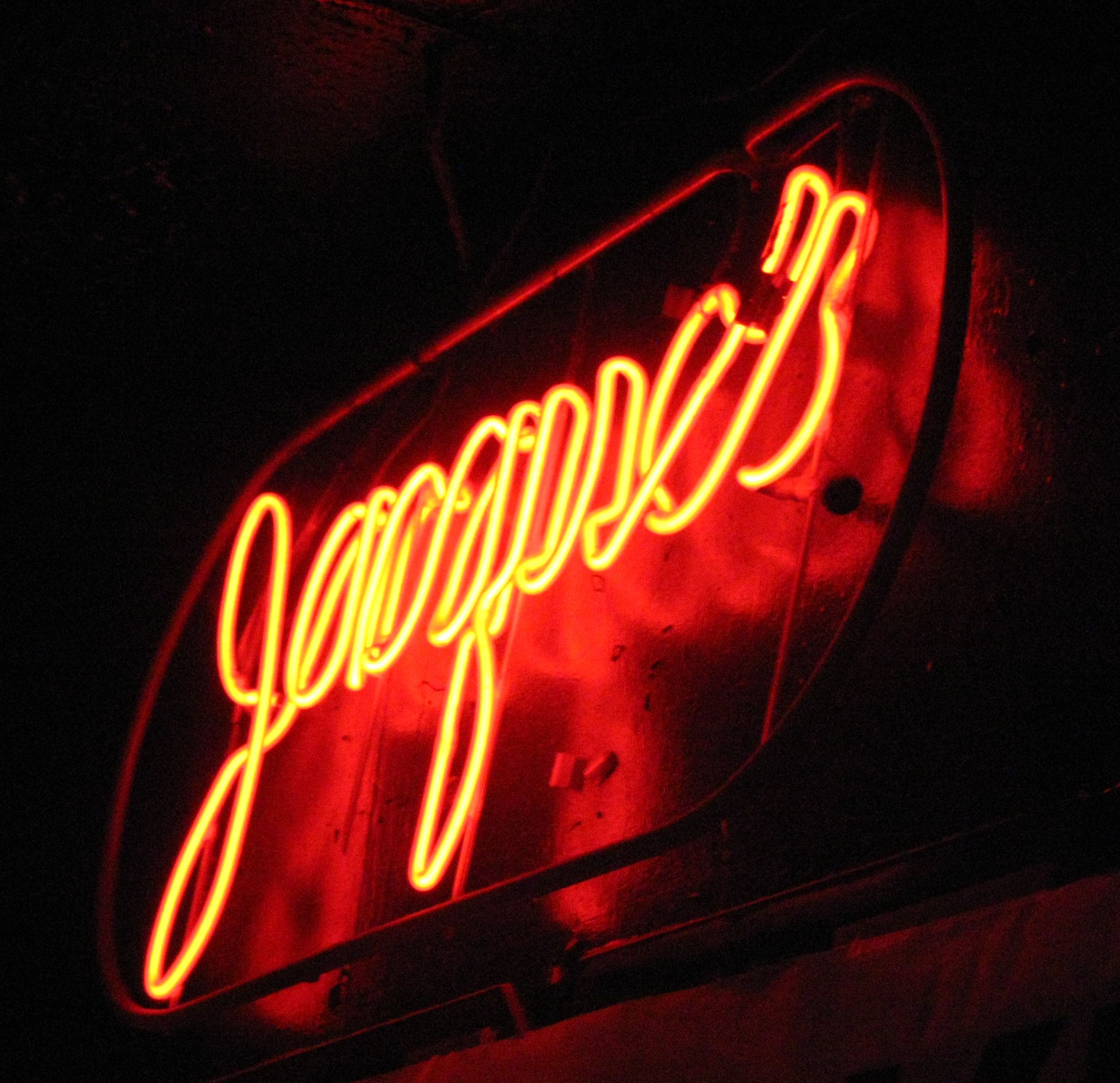 A neon sign at Jacques Cabaret.