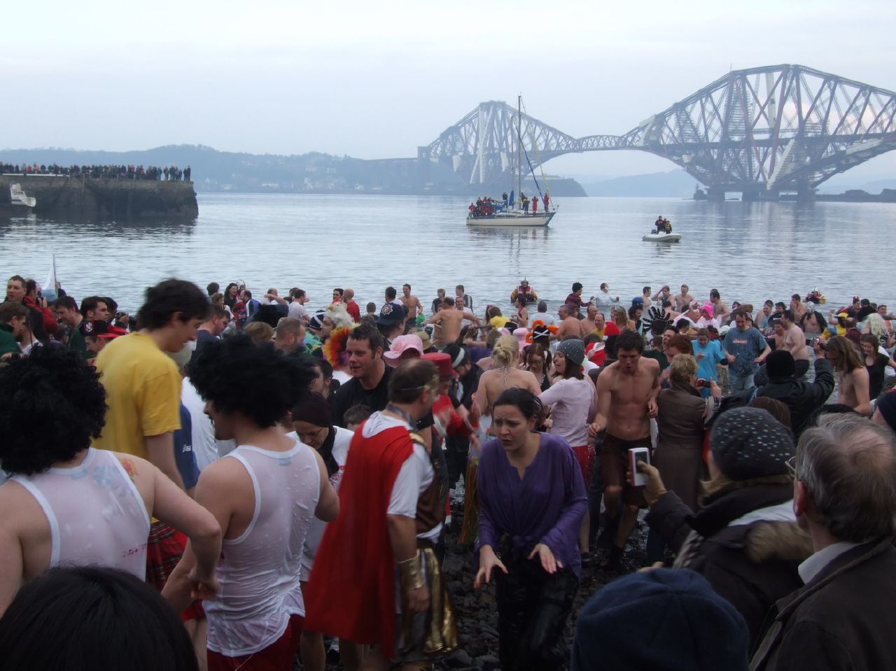 New Year: Hogmanay celebrations continue with ice-cold Loony Dook, UK News