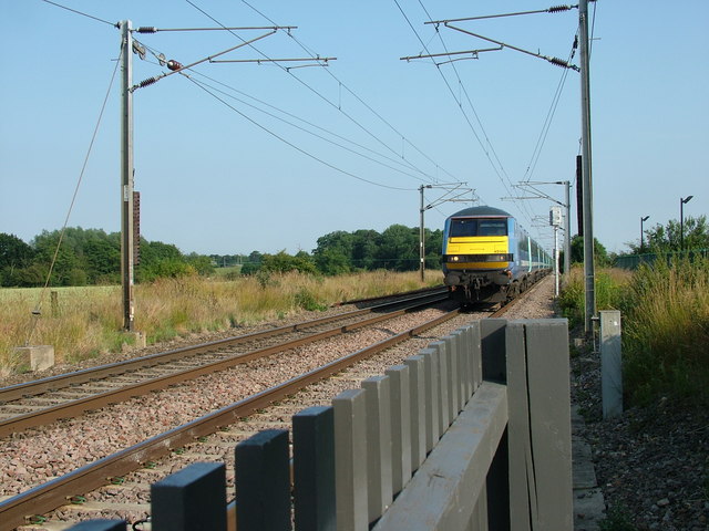 File:Train approaches crossing in Mill Lane. - geograph.org.uk - 1401966.jpg