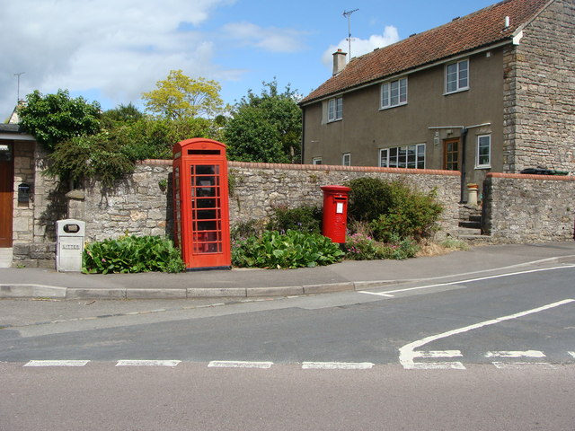 Red companions by the village green - geograph.org.uk - 1363200