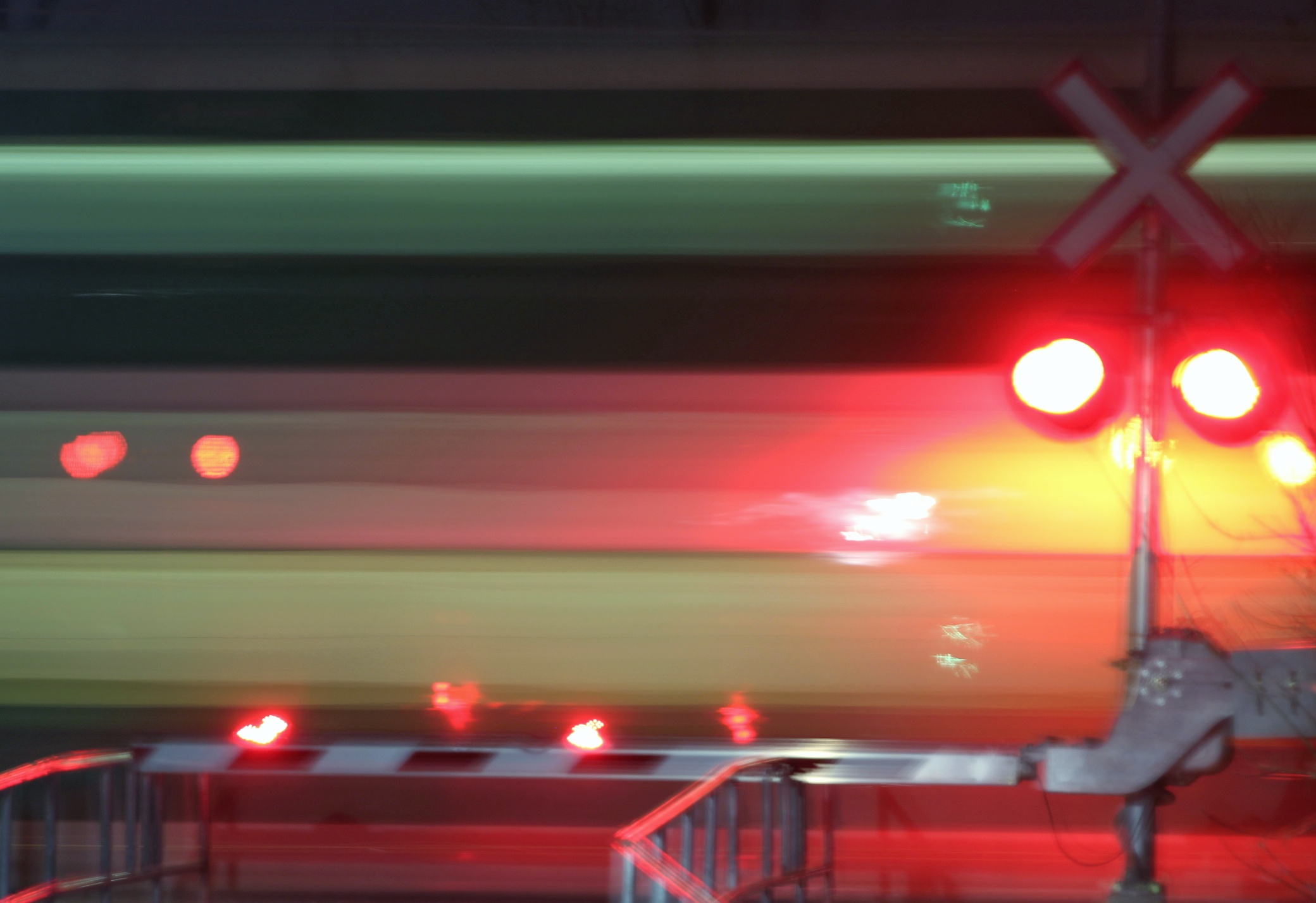 Lights crossing. Motion Blur. Level Crossing in Germany.