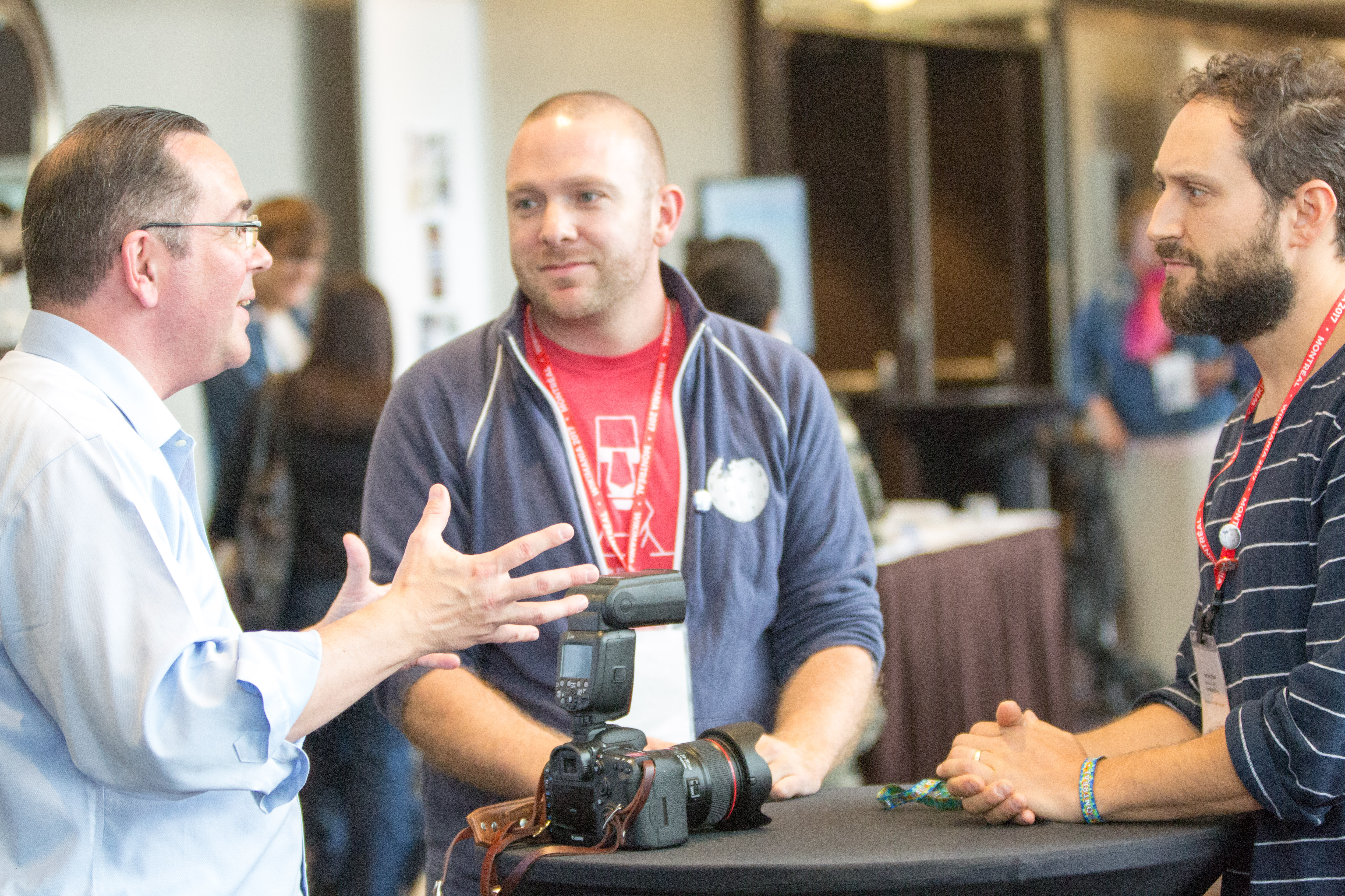 Frank during Wikimania, talking to Tighe Flanagan, Wikimedia's Senior Education Program Manager (middle), and Ben Vershbow, Wikimedia's new Lead Programs Manager (right)