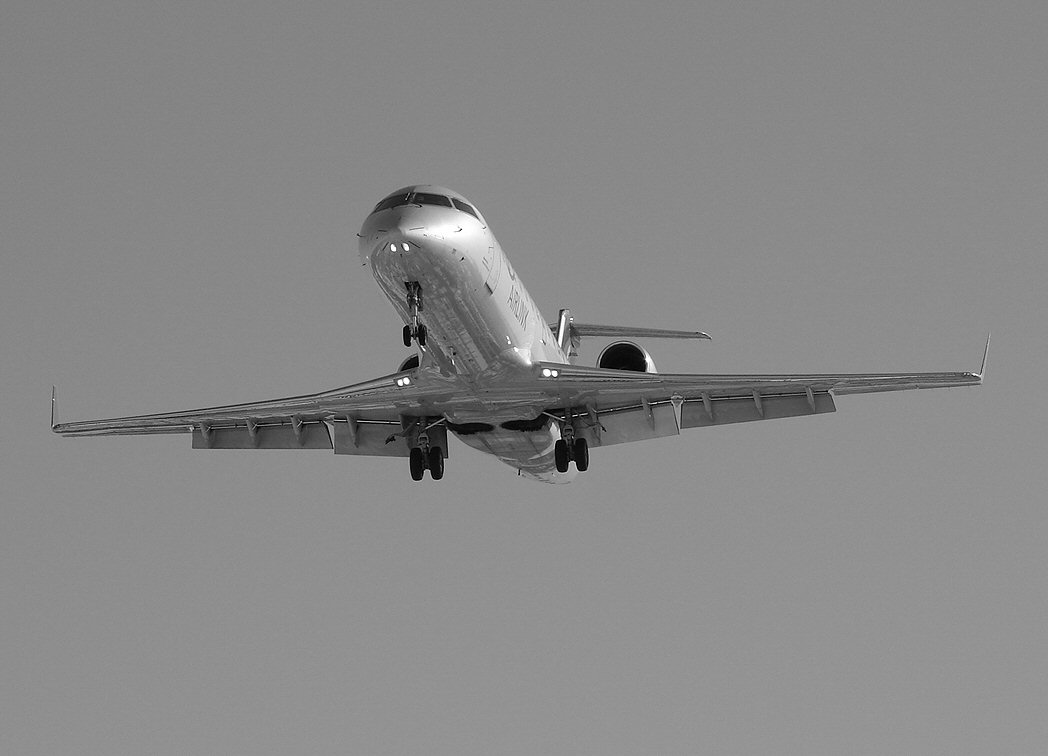 CRJ arrival in black-white (419176955).jpg