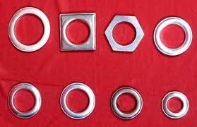 Grommet ring or edge strip inserted into a hole through thin material, typically of metal or plastic