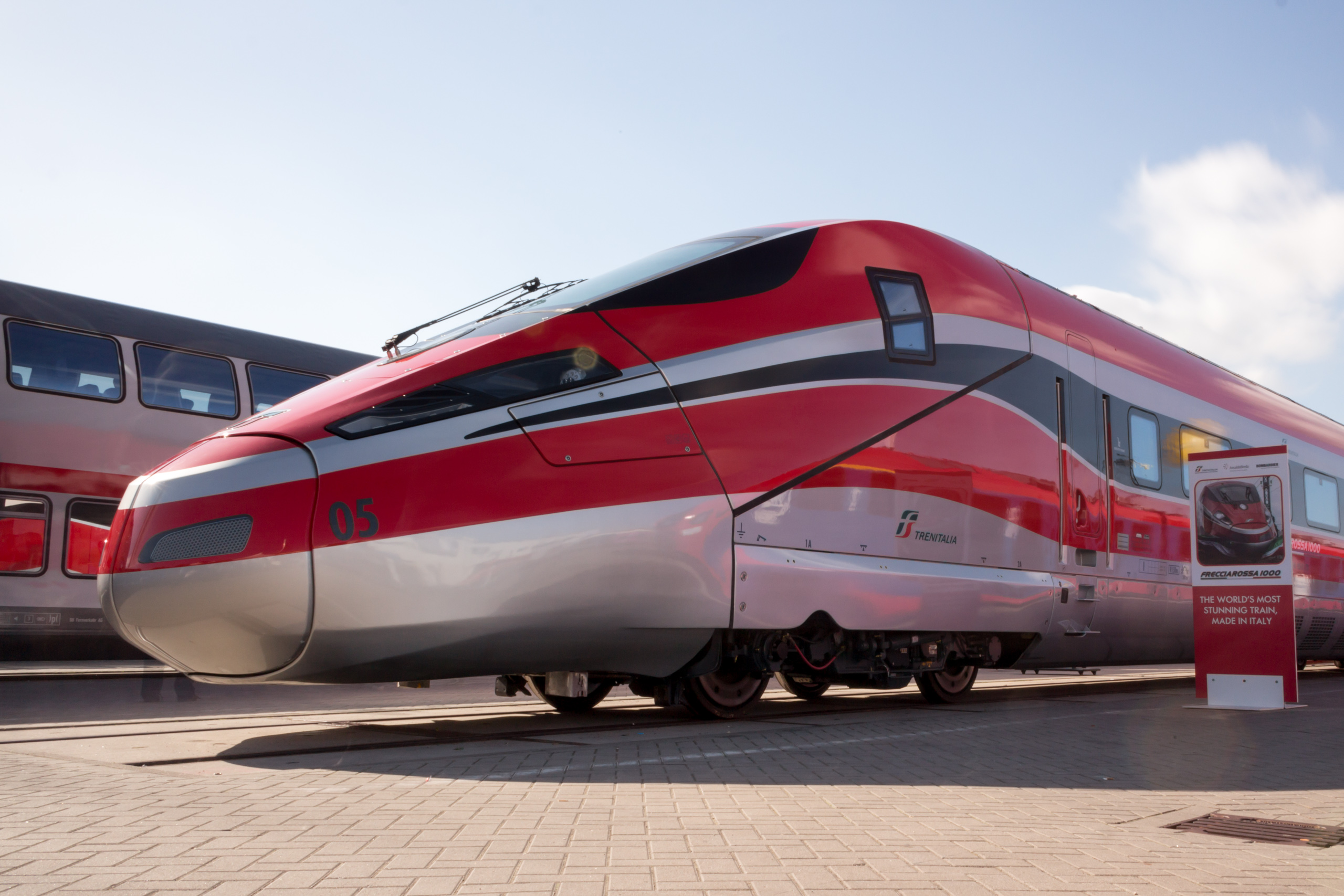 Trenitalia, Eurostar "Freccia Rossa" high speed train in Milan Stock Photo  - Alamy