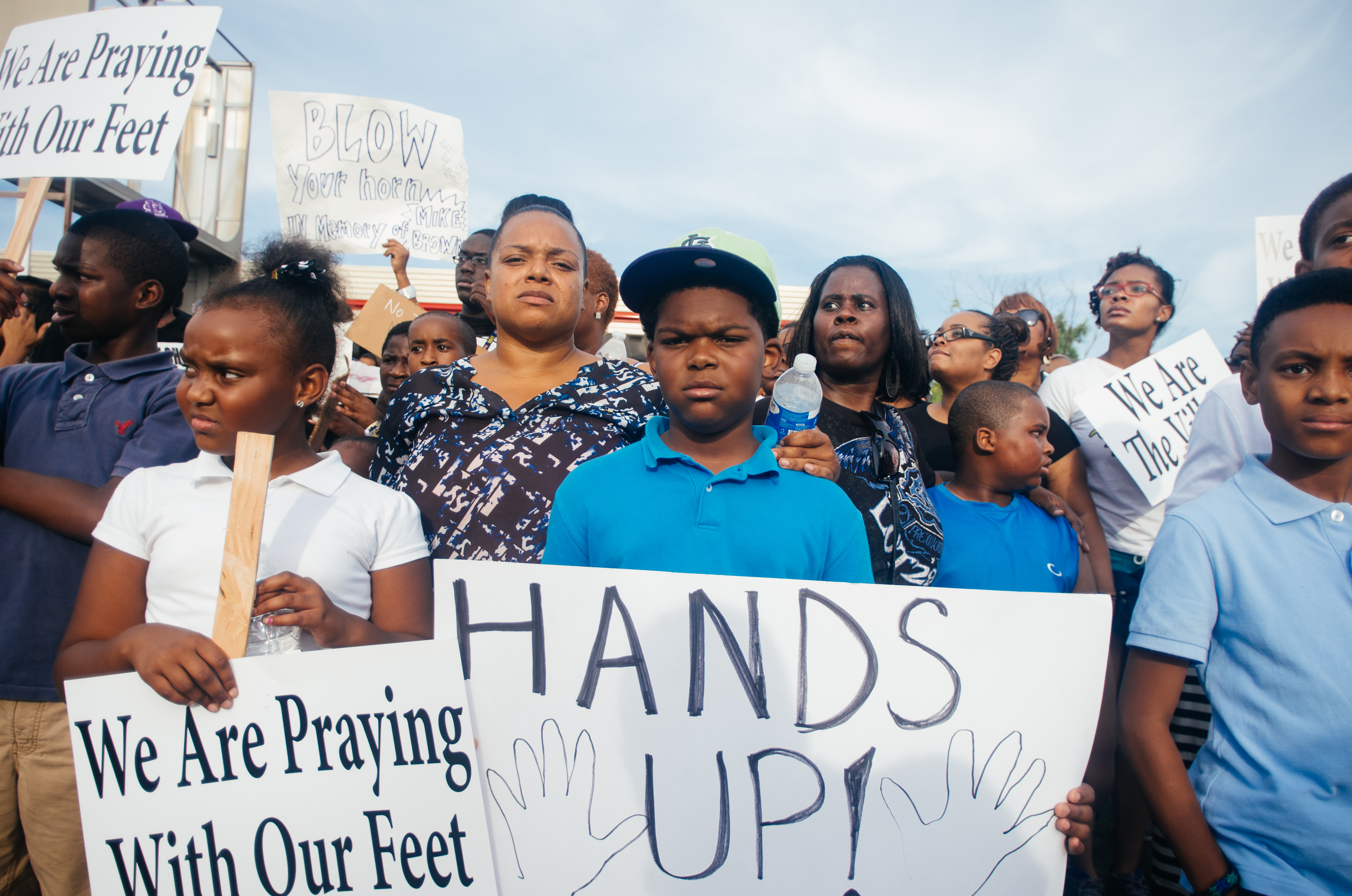 Protesters_with_signs_in_Ferguson.jpg