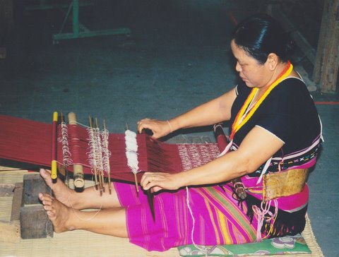 Woman weaving in Thailand