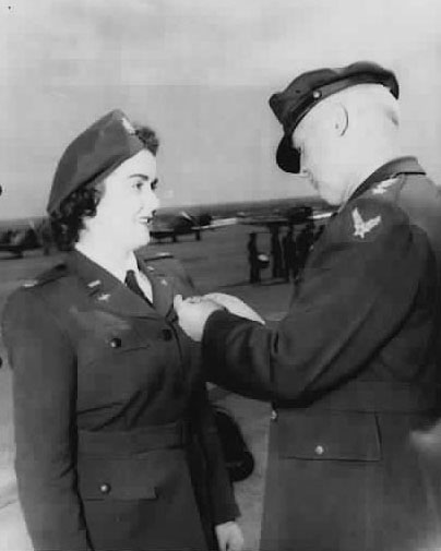 Barbara Erickson receiving a medal in 1944