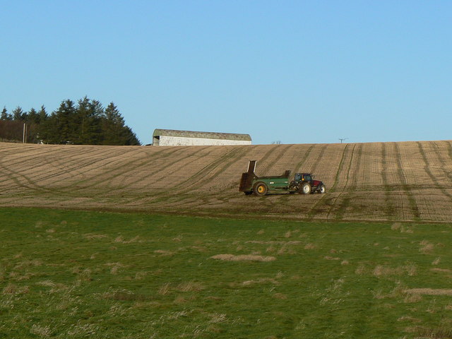 File:Tractor spreading on stubble - geograph.org.uk - 288373.jpg