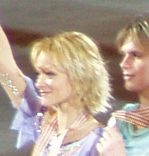 Albena Denkowa with Maxim Stawiski in the background at the award ceremony for the 2004 World Cup in Dortmund