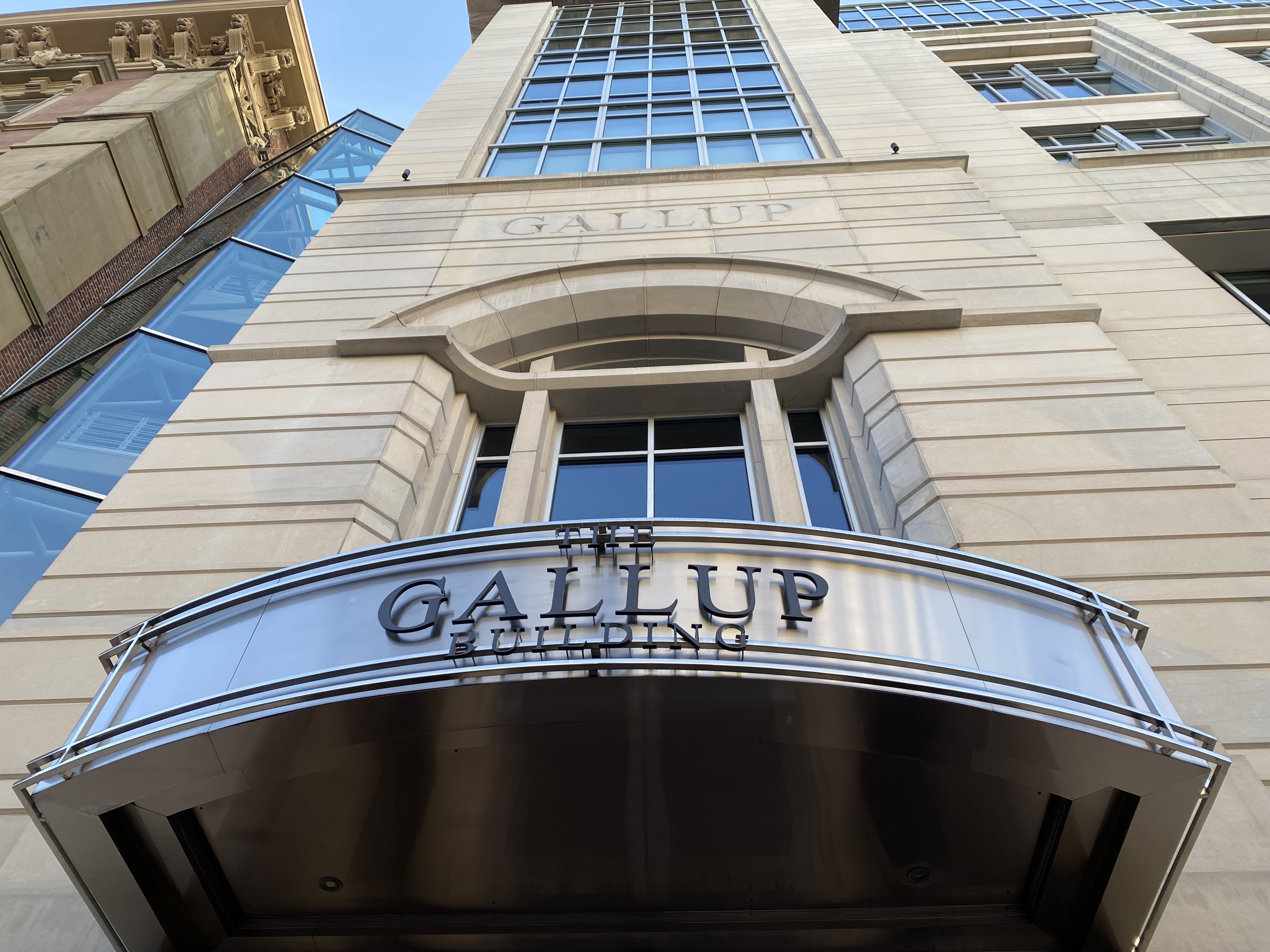 The Gallup Organization office in [[Washington, D.C.]] with a reflection visible of the neighboring [[National Portrait Gallery (United States)|National Portrait Gallery]]