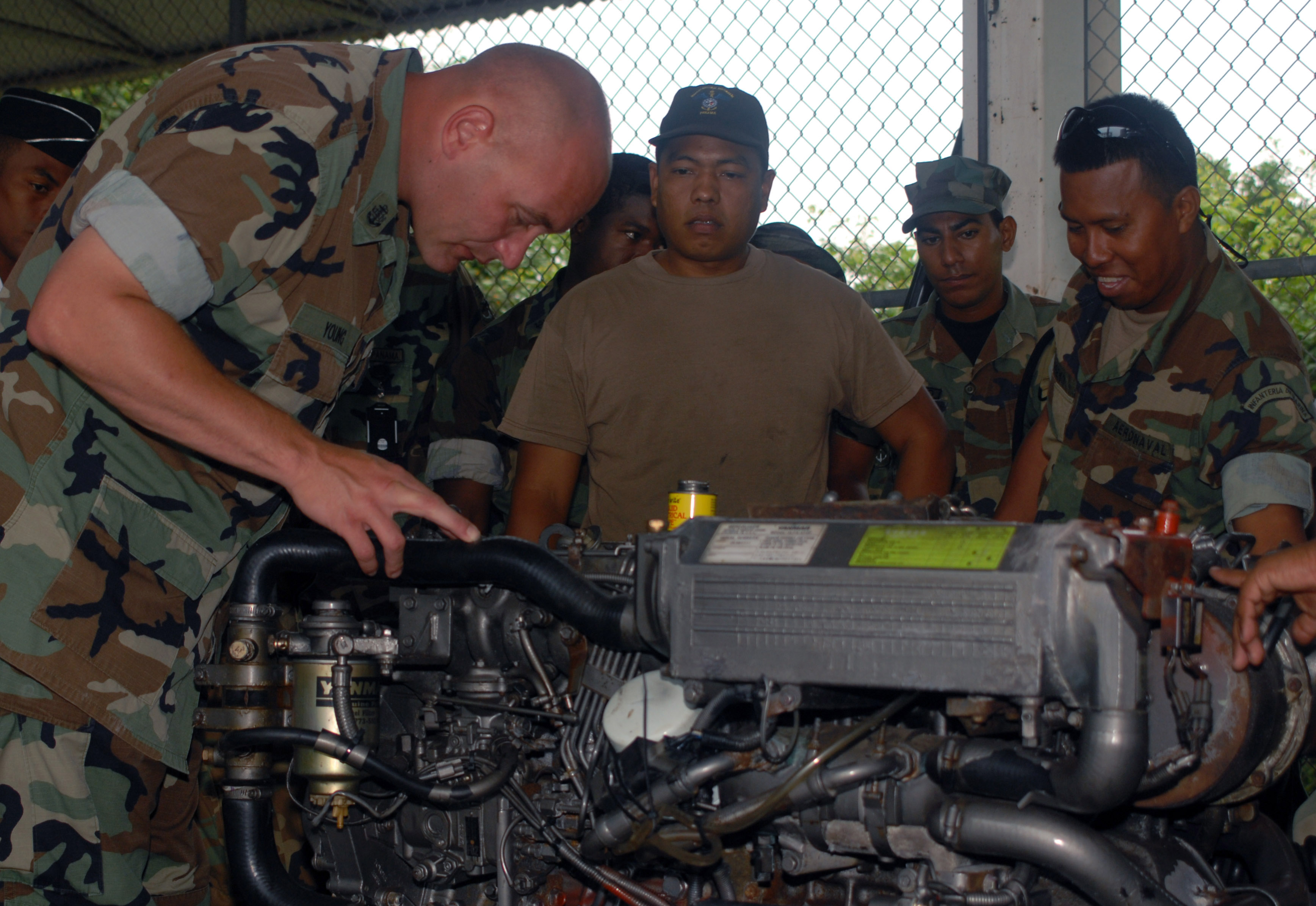 File:US Navy Chief Engineman Edward Young inspects the inner