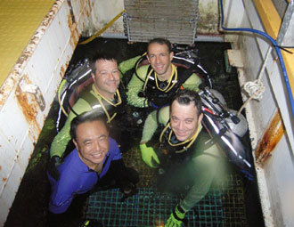 NEEMO 13 Crew in the wet porch/moon pool of the Aquarius habitat