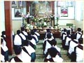 Students worshipping in shrine room