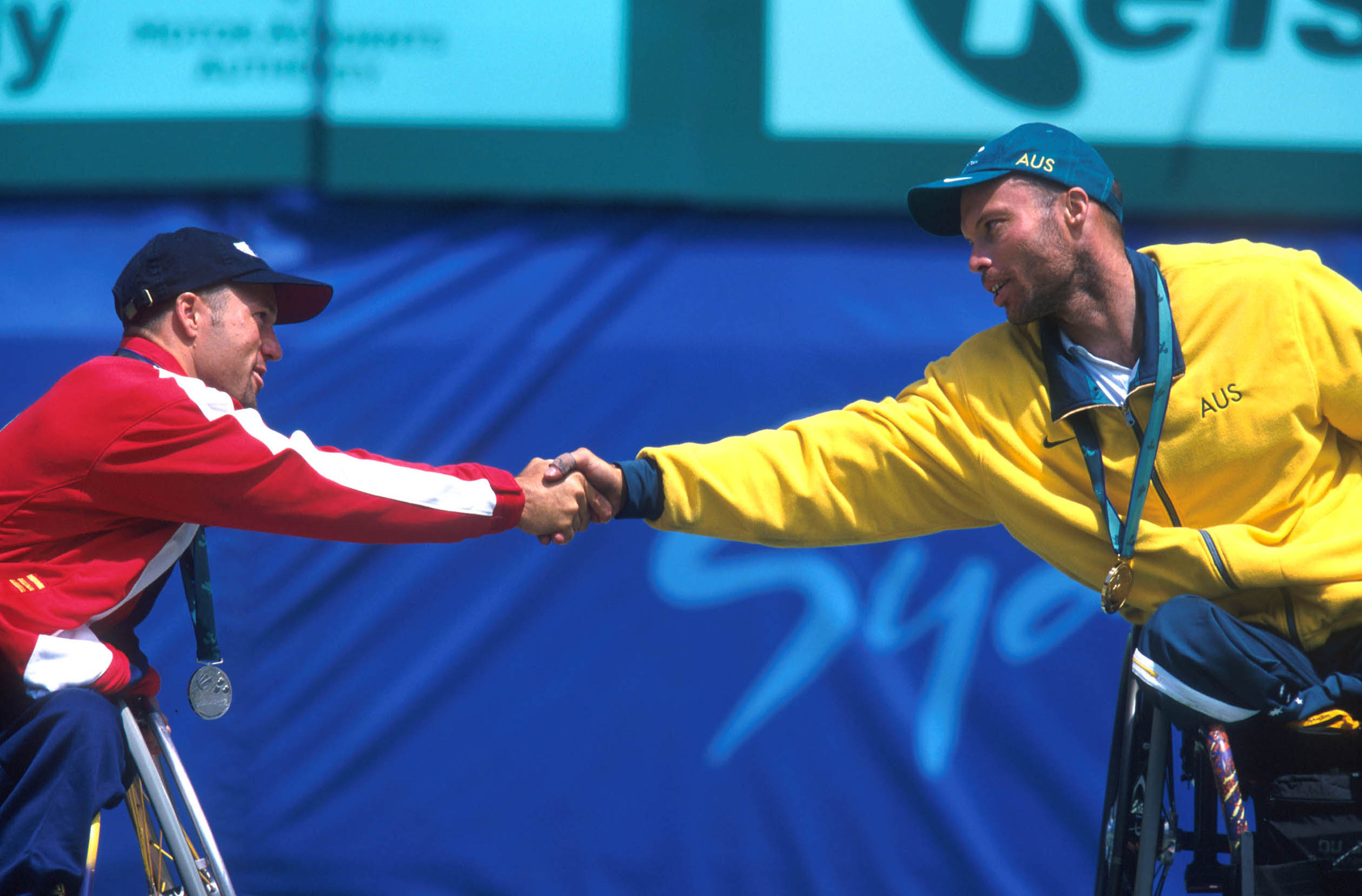 Welch (right) shaking hands with [[David Hall (Australian tennis)|David Hall]]