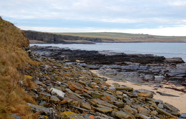 File:Boulders, sand and wave-cut platform - geograph.org.uk - 1091282.jpg