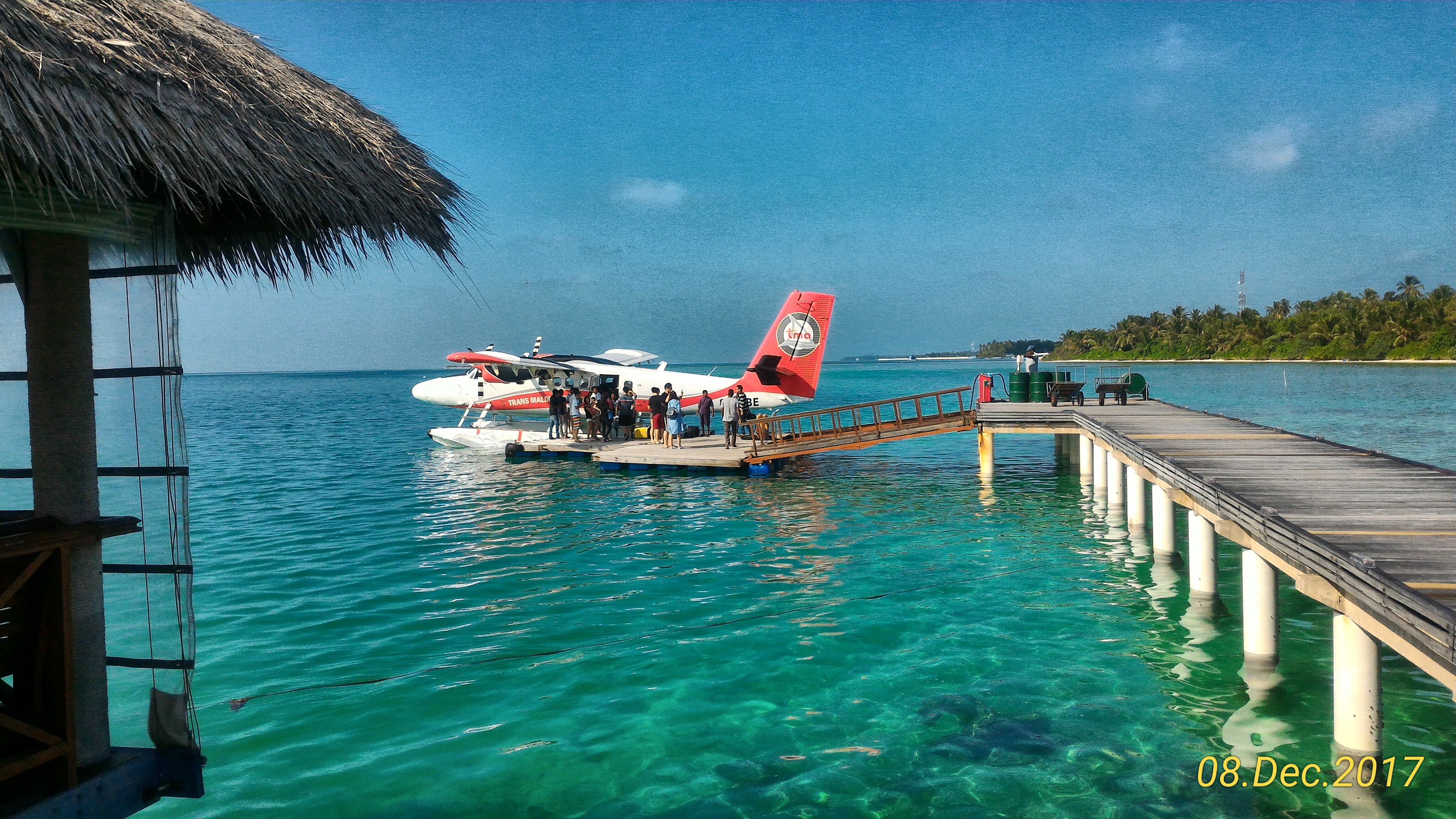 G island. Medhufushi Island Resort. Maldives people.