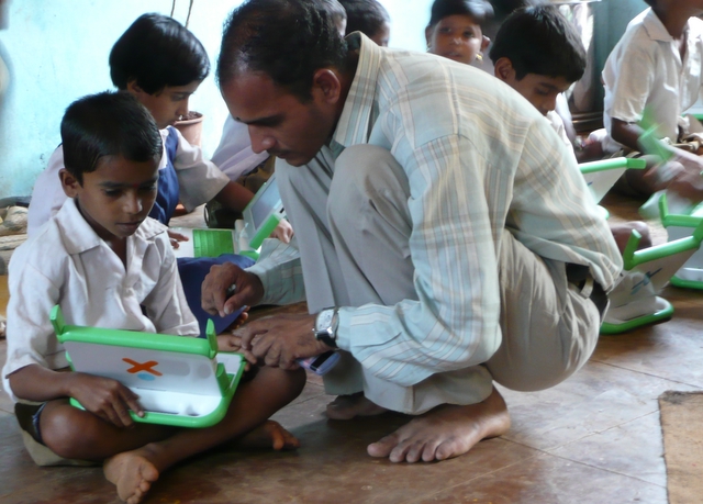 File:Teacher and Kaushal OLPC.JPG