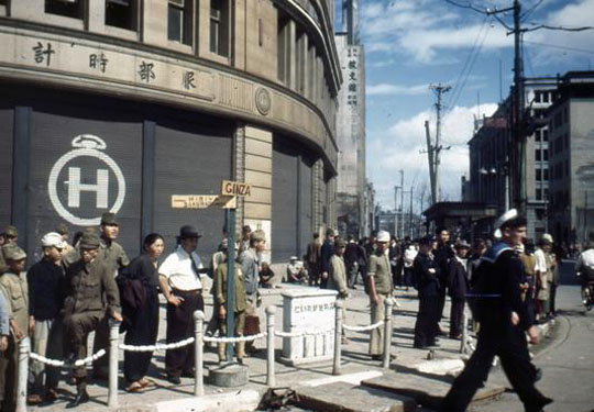 File:1945 Image of Hattori Tokei-ten building used by GHQ at Ginza 4-chome intersection.jpg