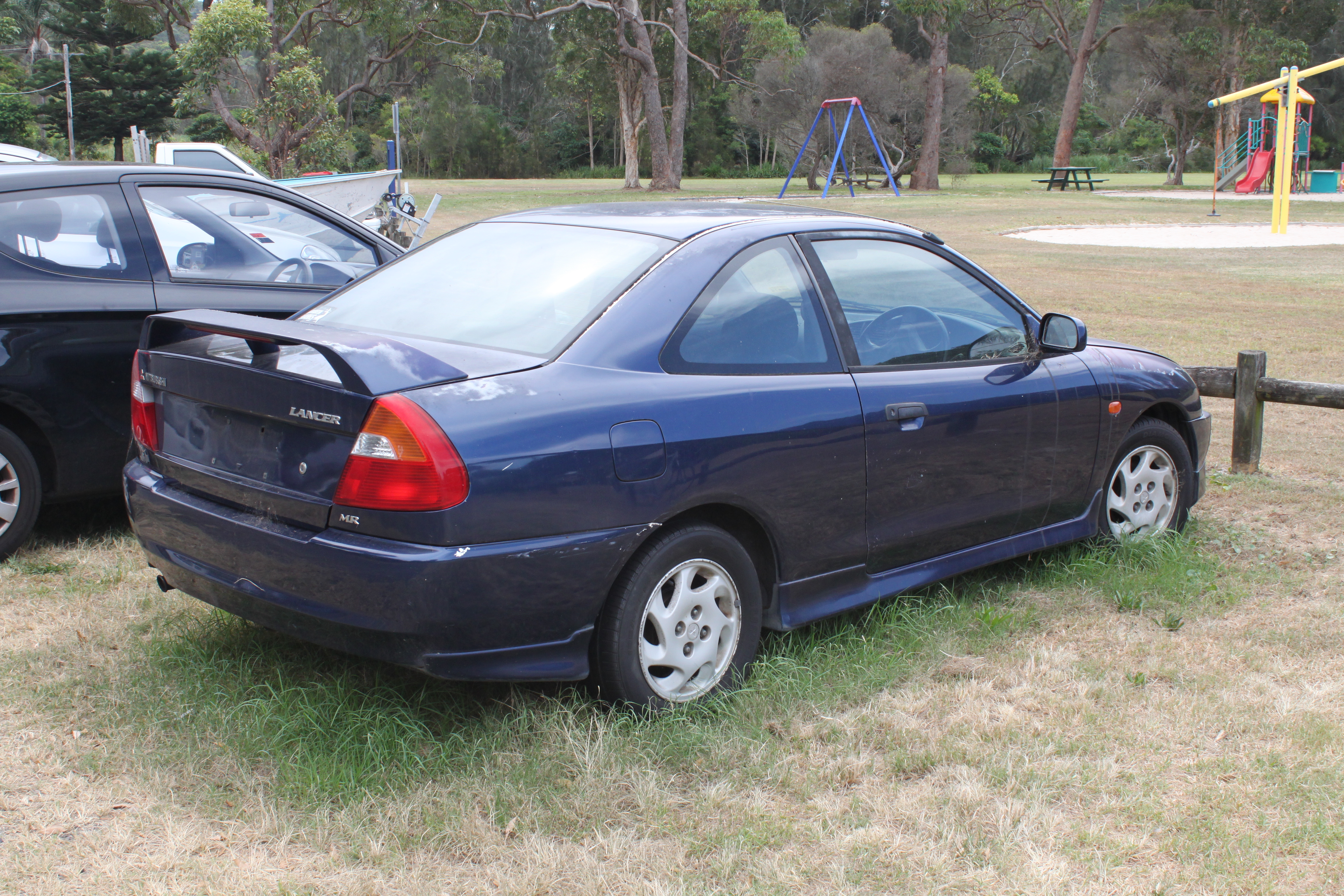 Лансер 1998. Mitsubishi Lancer 1999. Митсубиси Лансер 1998г. Мицубиси ланцер 1999. Тойота ланцер 1998.