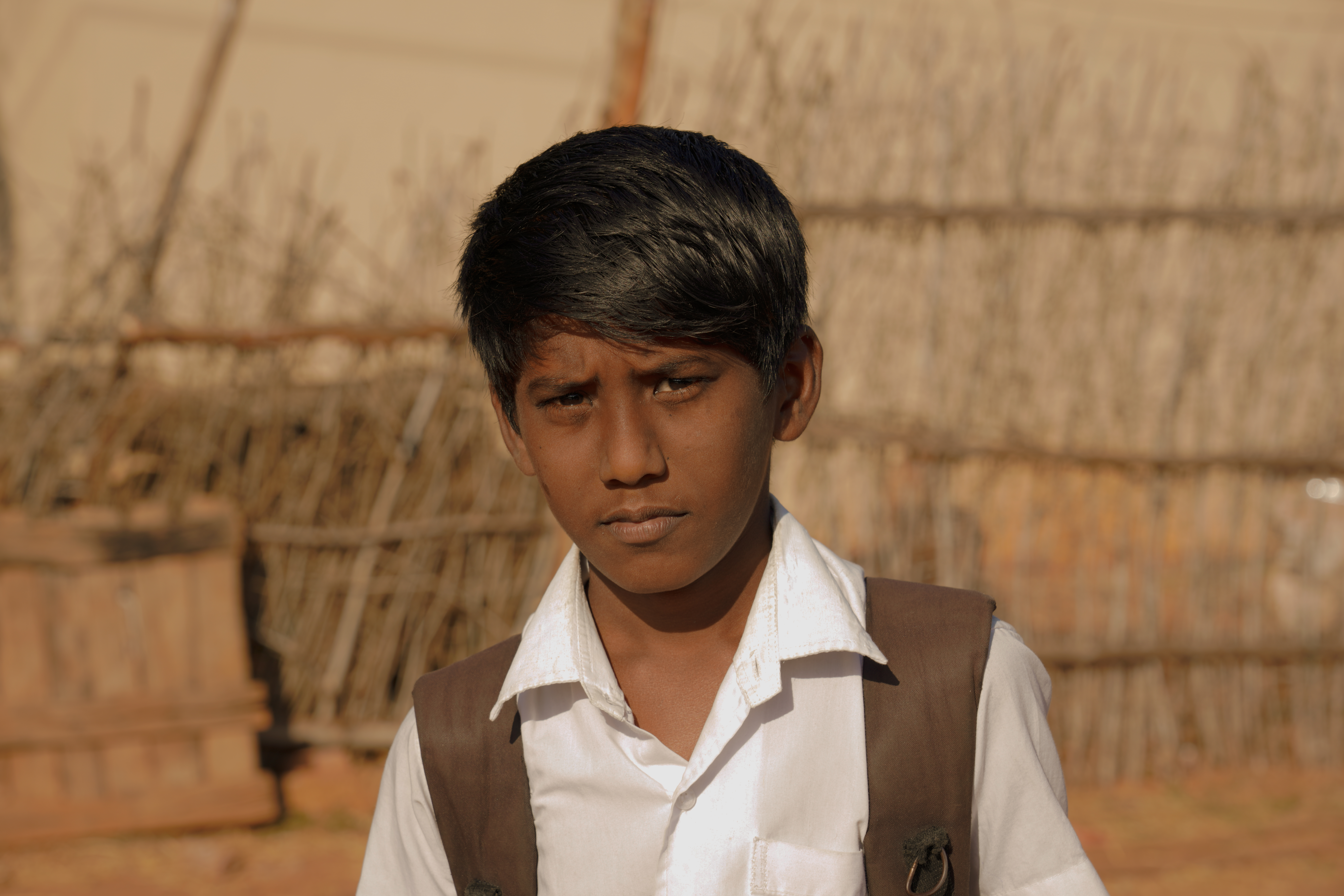 PONDICHERY, PUDUCHERRY, TAMIL NADU, INDIA - SEPTEMBER Circa, 2018. An  Unidentified Poor Indian Boy With A Smiling And Serious Eyes Looks In The  Camera Stock Photo, Picture and Royalty Free Image. Image 120103739.