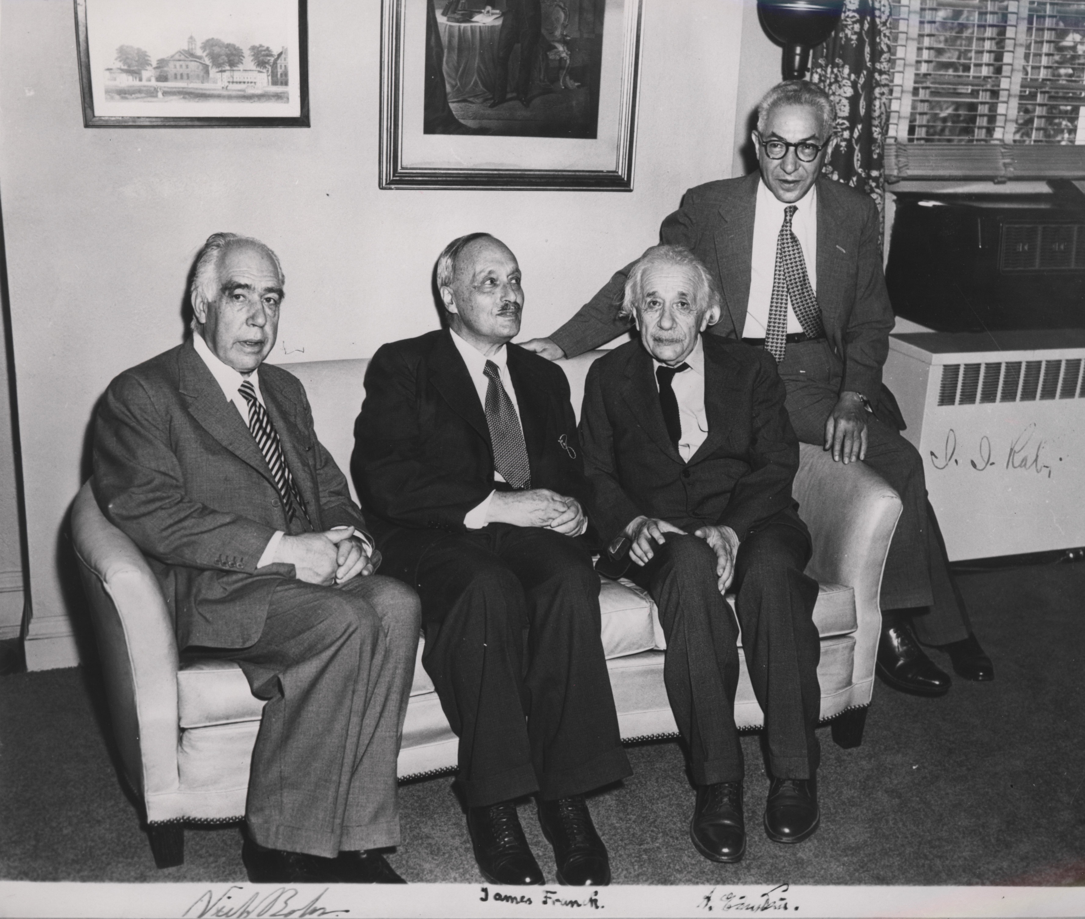 Albert Einstein having lunch with Niels Bohr and others - The