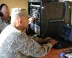Army National Guardsmen operating a RIAB Radio in a box NG.jpg