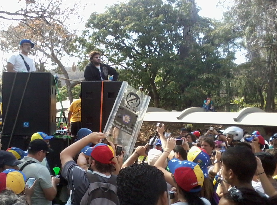 File:Protester with riot shield Venezuela 2014.jpg - Wikimedia Commons