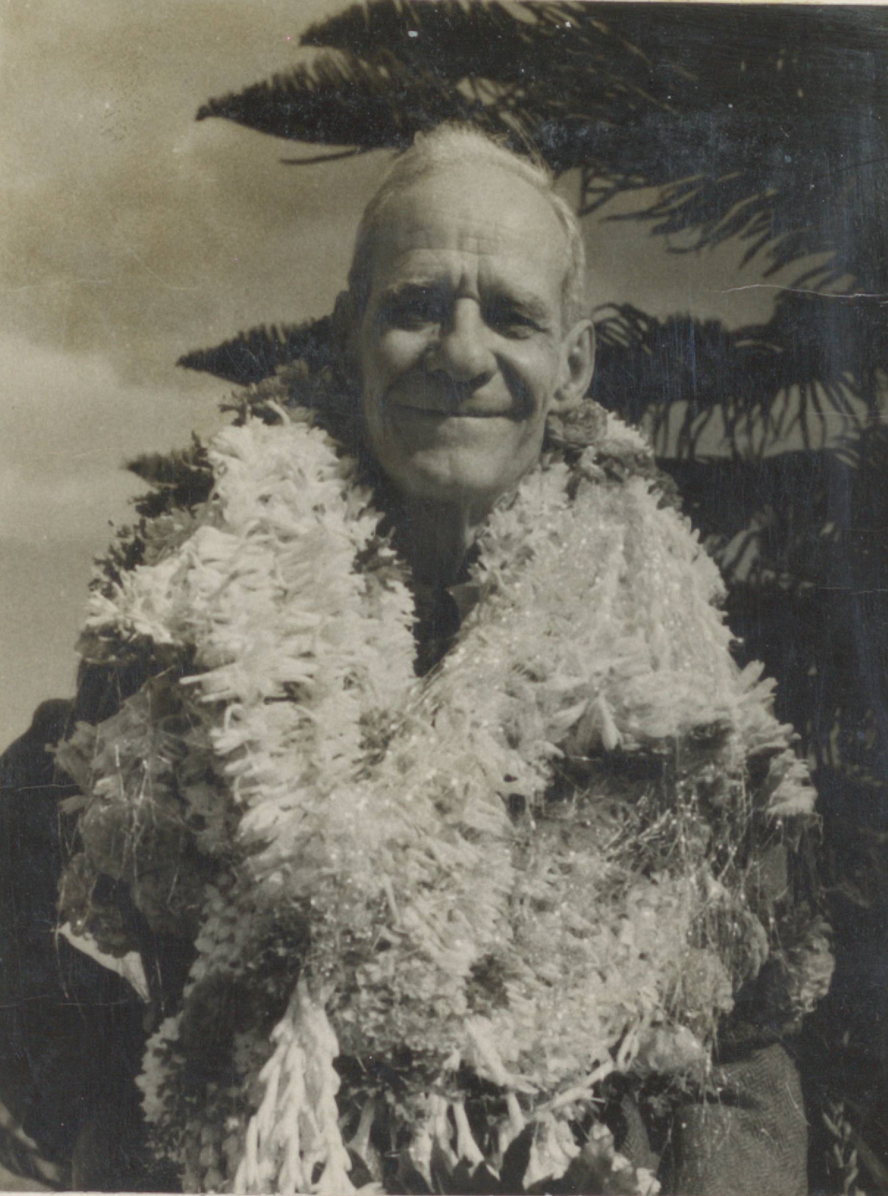 Coleman with garlands on his 1953 visit to India