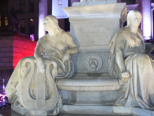 File:Figuren am Sockel der Schiller Statue (Figures at the Base of the Schiller Statue) - geo.hlipp.de - 29427.jpg