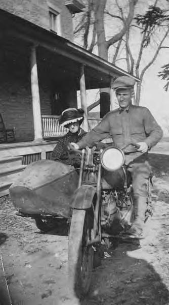 File:Man on motorcycle with woman in sidecar, location unknown, 1921 (INDOCC 793).jpg