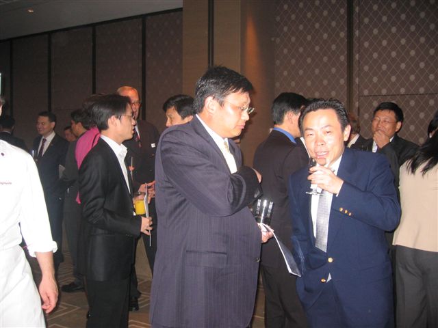 File:Xiang Bing, Dean of the Cheung Kong Graduate School of Business and Zhang Yue, Chairman, Braod Air, sharing a light moment, at the 2005 Horasis Global China Business Meeting - Flickr - Horasis.jpg