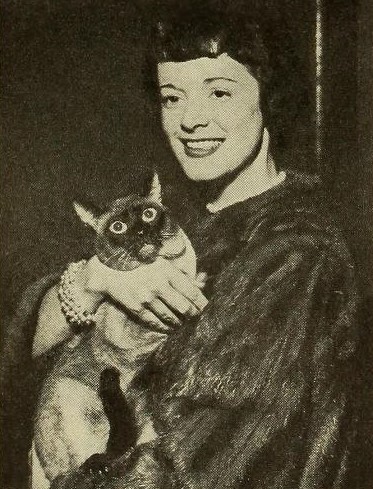 Gisele MacKenzie opens the National Cat Show, 1952