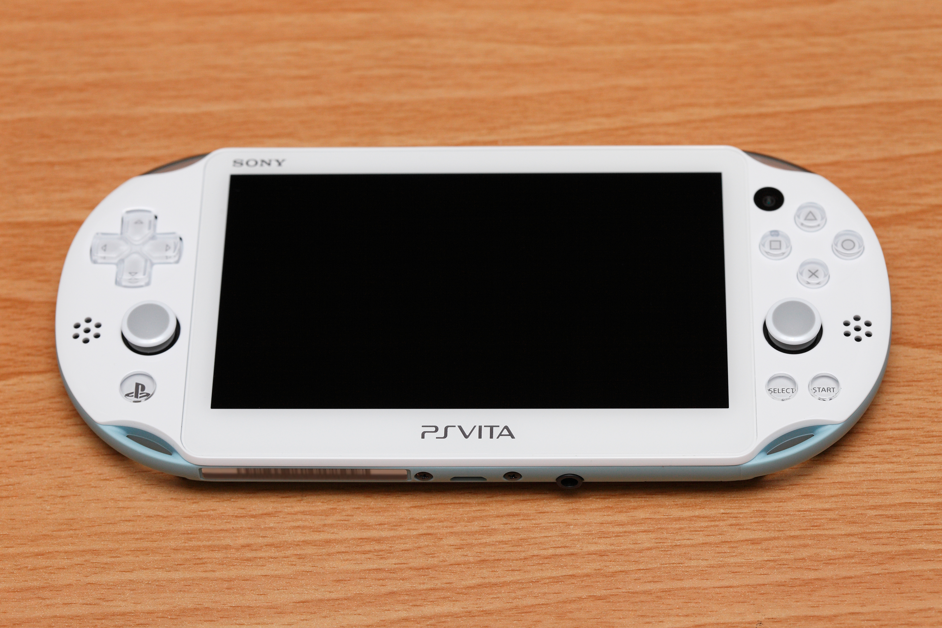 File:PlayStation Vita PCH-2000 white 20150101 face.jpg - Wikimedia