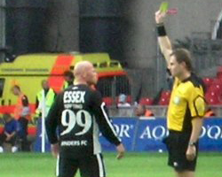 Stig Tøfting takes a yellow card (2007)